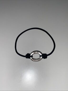 I Care About Sea Turtles Silver Ring Bracelet on Black Cord